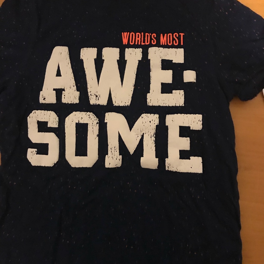 Navy blue T shirt with orange and blue specks